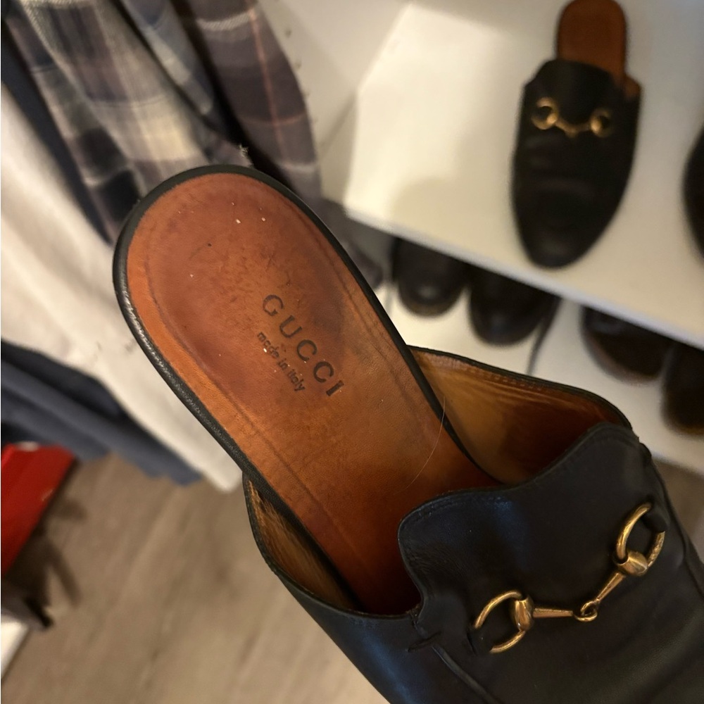 Gucci Black Leather Mules with Gold Detail